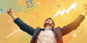 Small business owner celebrating sales growth.